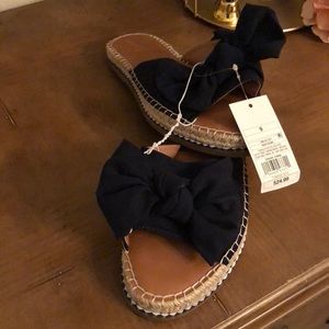 Slip on sandals in black cloth